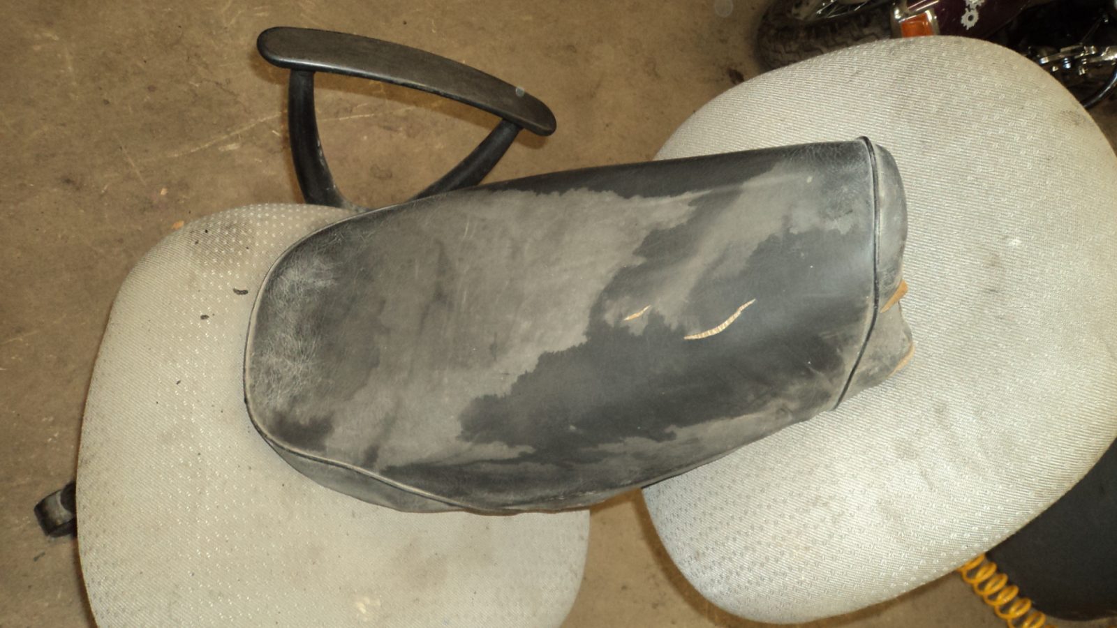 Vintage Motorcycle Seat with Marking '391K' photo